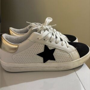 Steve Madden Black and White Sneakers with Gold Highlights